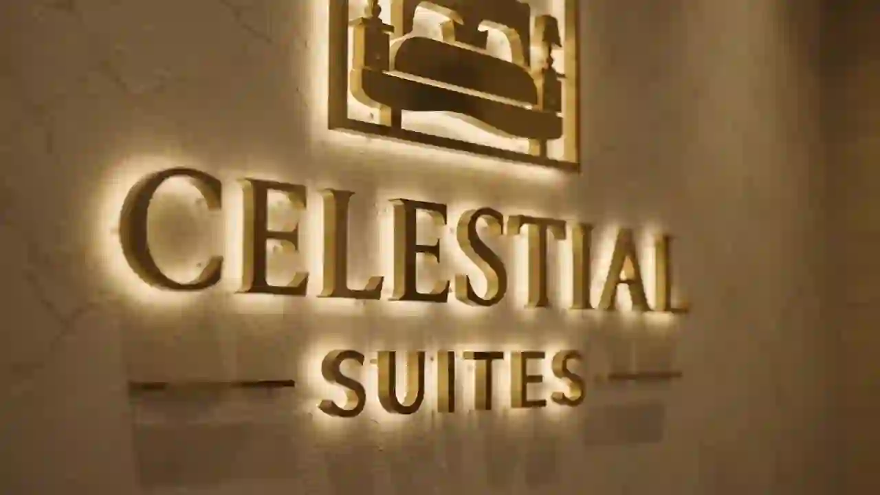 Illuminated Celestial Suites hotel sign from the website hero video